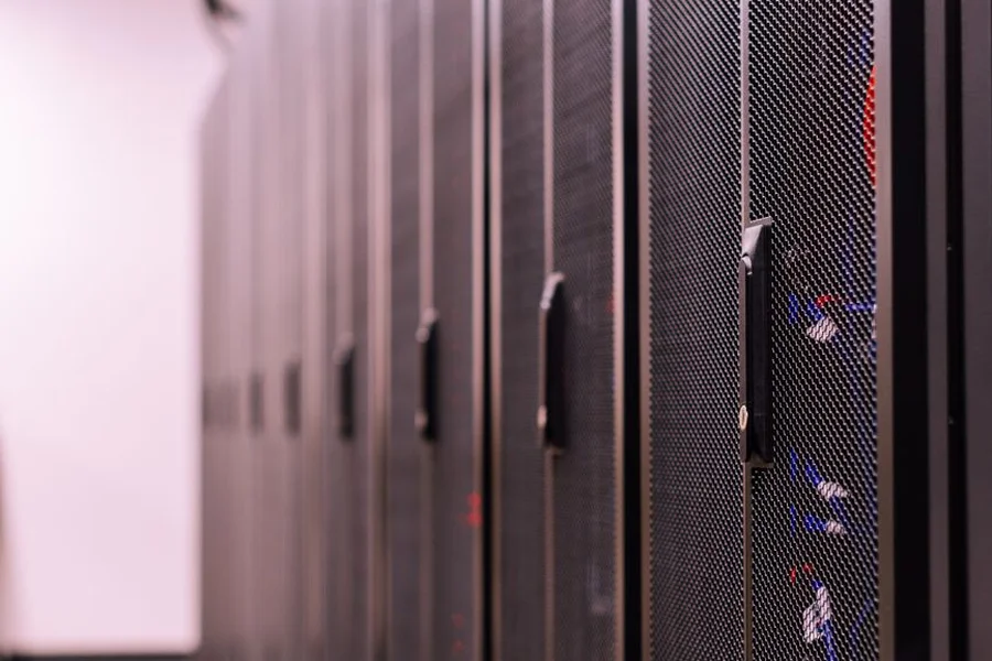 Software Process Monitoring server room displaying active computer process monitoring and data systems
